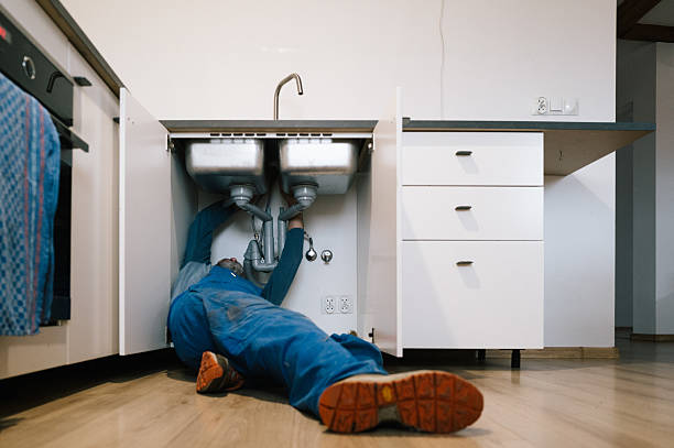 Professional Drain Cleaning technician working in Rolla, ND